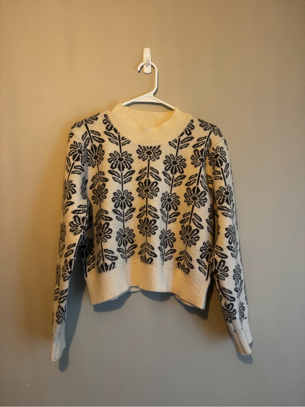 &Merci Ivory Crewneck Sweater with Black Floral Motif
